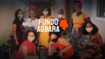 Fotografia com logo do Fundo Agbara, e oito mulheres, ilustrando o texto "Potencializando mulheres negras e indígenas".