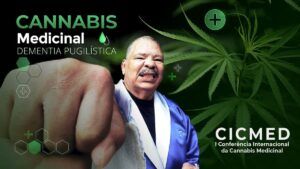 Arte com foto do ex-boxeador Maguila e texto: Cannabis Medicinal e Dementia Pugilística. Ele é um homem preto de cabelos e bigode grisalhos e está simulando um golpe com a mão fechada.