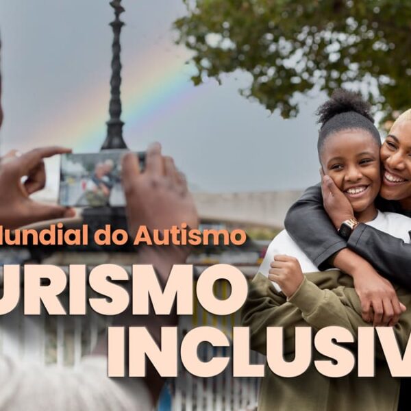 Pessoa capturando um momento afetuoso entre duas pessoas, simbolizando o turismo inclusivo para pessoas autistas.